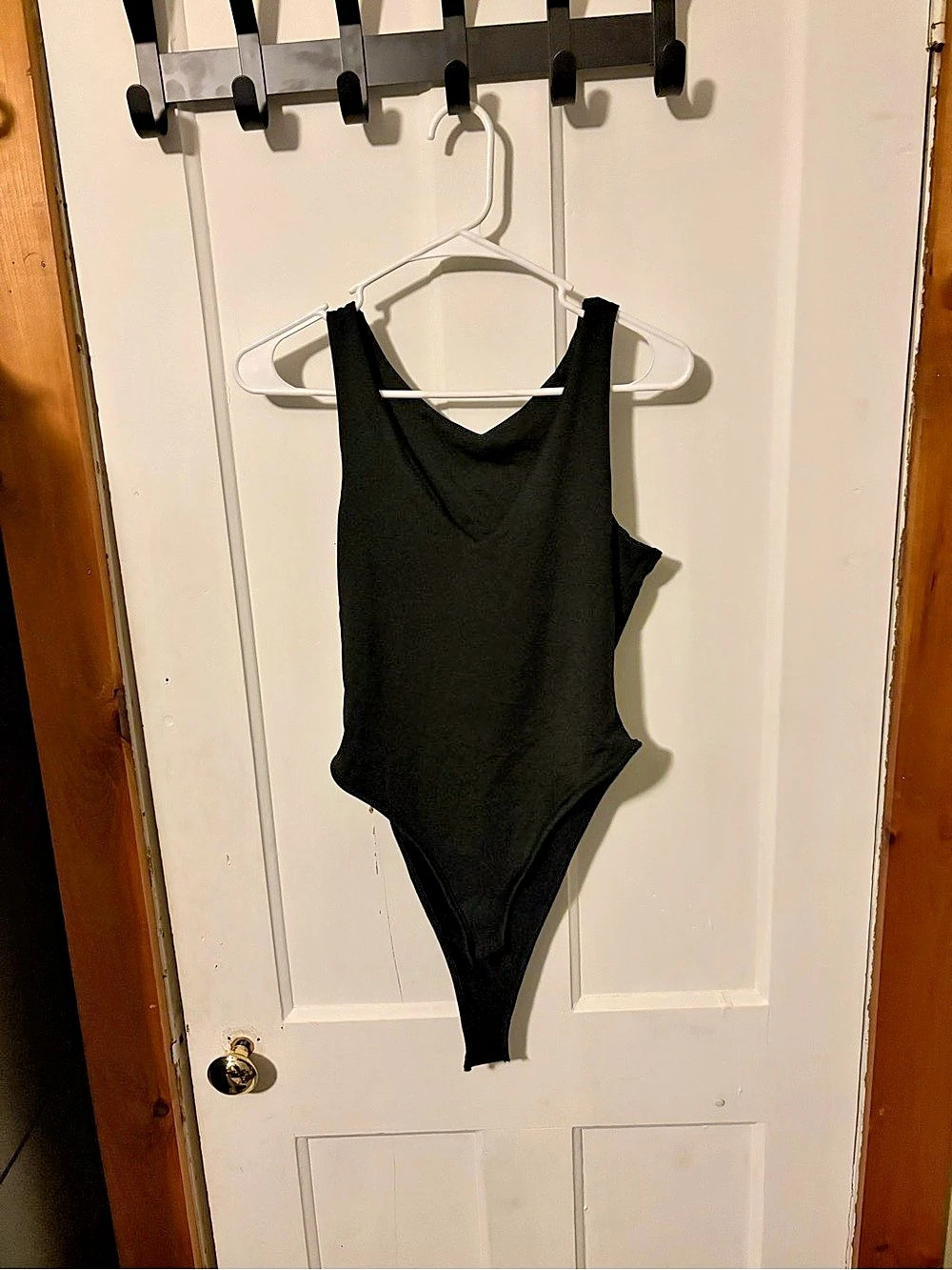 Black One-Piece bodysuit Size Medium